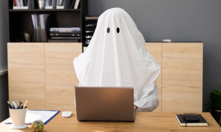 ghost writing at a desk min ghost writing at a desk