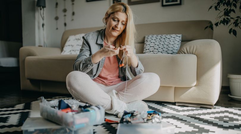 side business ideas featured min woman crafting as a side hustle